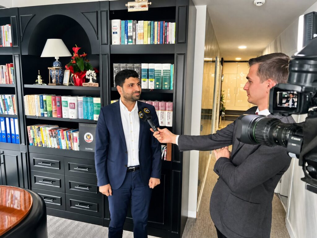 Attorney Ferhat Küle giving an interview to a 24 TV reporter